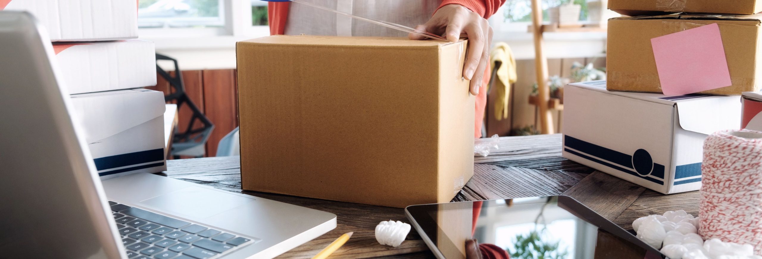 Person Starting a business by unpacking
